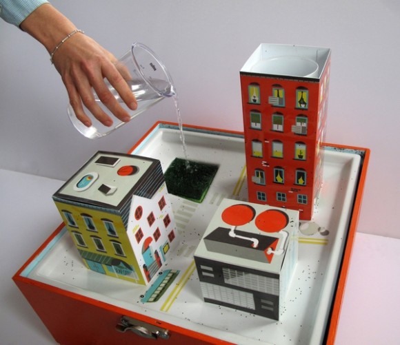 Sewer in a Suitcase, a workshop tool and working model of New York Citys combined sewer system that demystifies the hidden workings of the citys water infrastructure by following the journey water takes beyond the drain, photo courtesy Desktop mag/The Center for Urban Pedagogy.