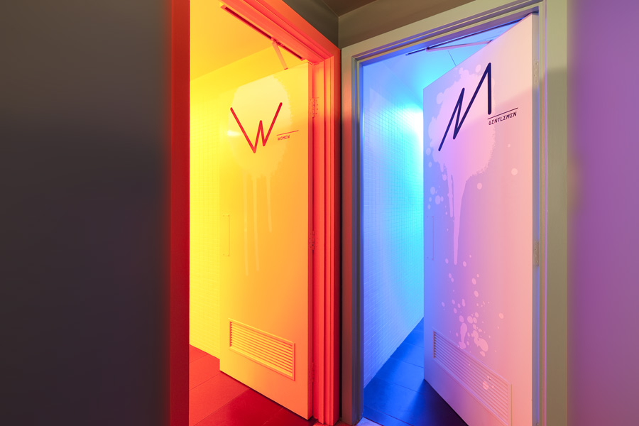 Neon lights ensure the bathrooms are in keeping with the venue’s insalubrious namesake