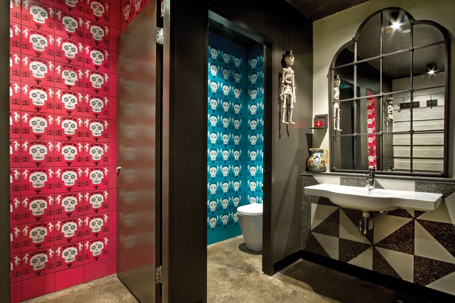 The Señoritas bathrooms are finished in Day of the Dead tiles, hand-painted by Aaron McKenzie. Photo by Lisbeth Grossman