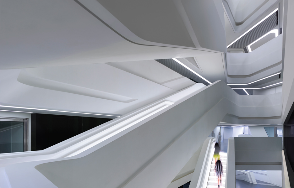 A typically ‘Zaha’ interior atrium space, replete with swooshing geometry and concealed strip lighting