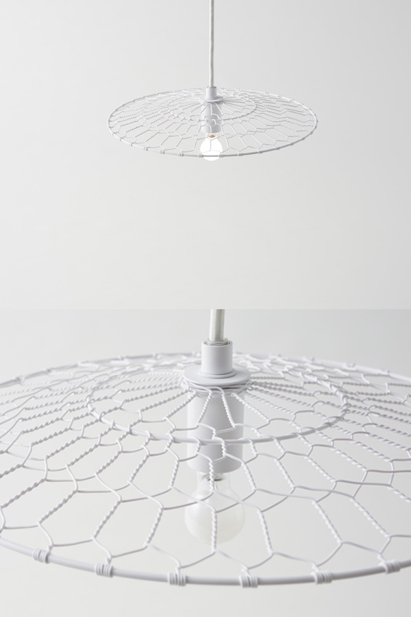 Nendo Studio's Basket Lamp comes in black or white powder coated finish