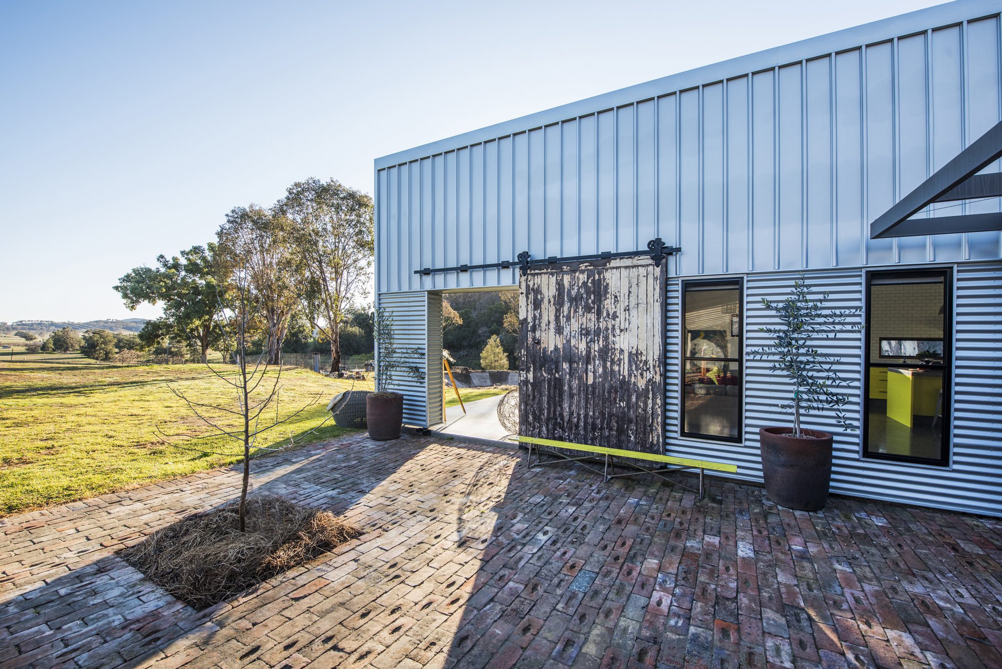 Queens Pinch Road house in Mudgee recycles materials in a new addition that reorients the house. Photo by Amber Hooper.