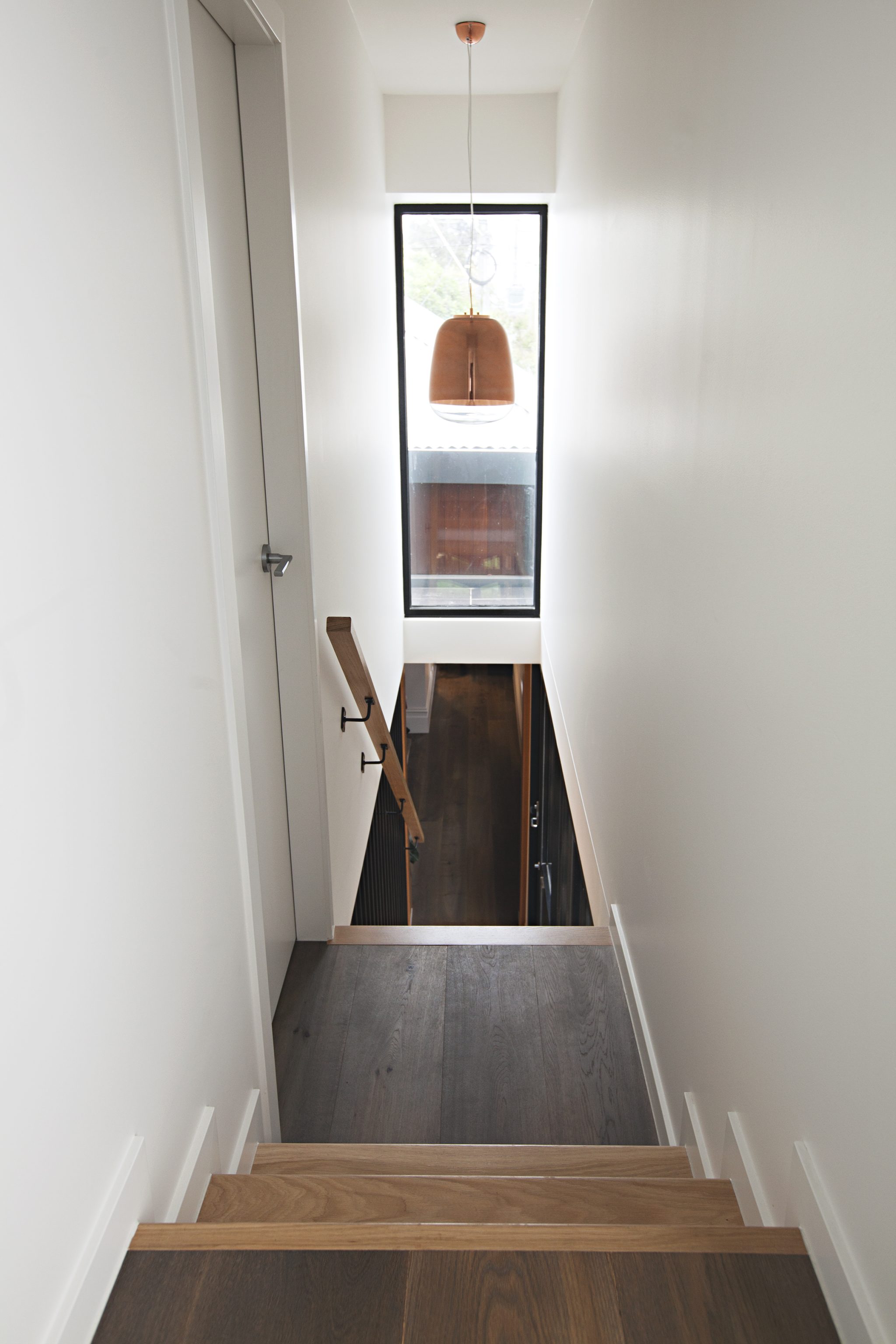 Looking down the staircase with the landing.