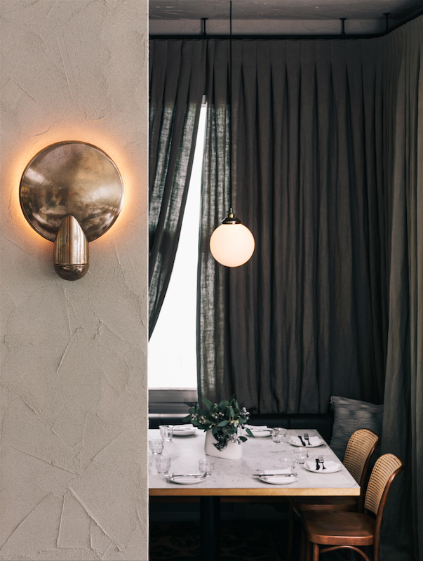 Surface wall sconce at the Paddington Inn, Sydney, designed by George Livissianis.