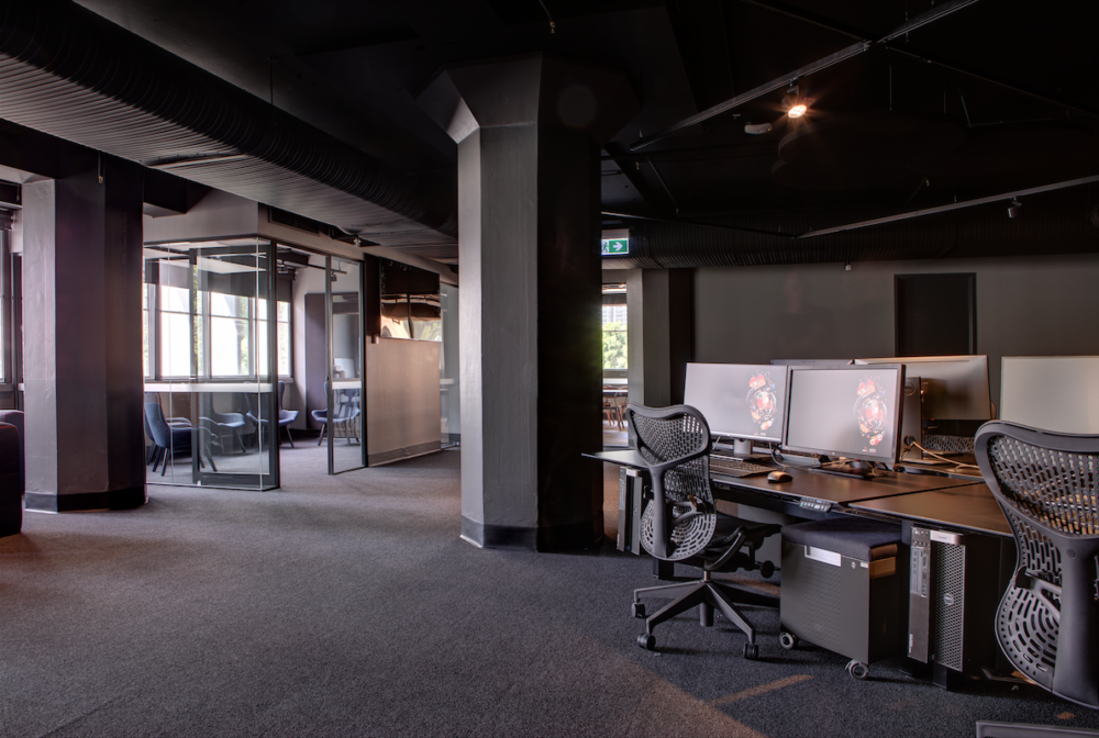 Workstations and meeting rooms in the Animal Logic Academy, Sydney. Photo by Brett Boardman.