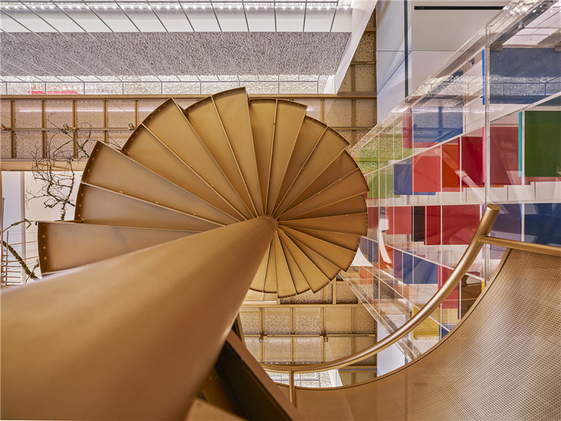 The corkscrew stair is a nod to the double helix.