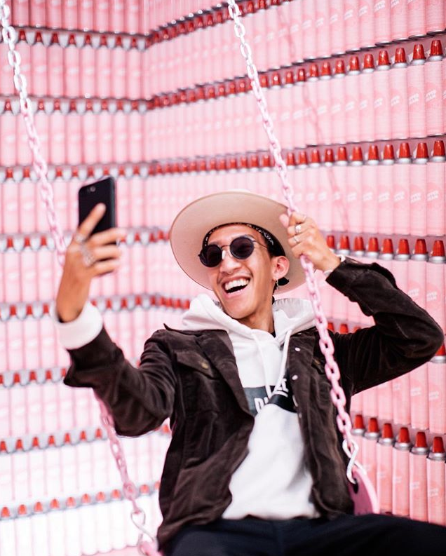 Someone takes a selfie in the Museum of Ice Cream