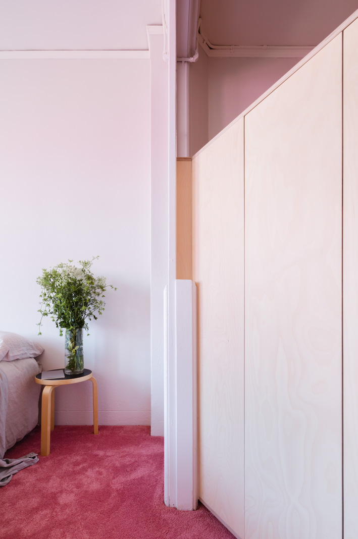 Rose pink carpet compounds the reflected pink light to include the ceiling 