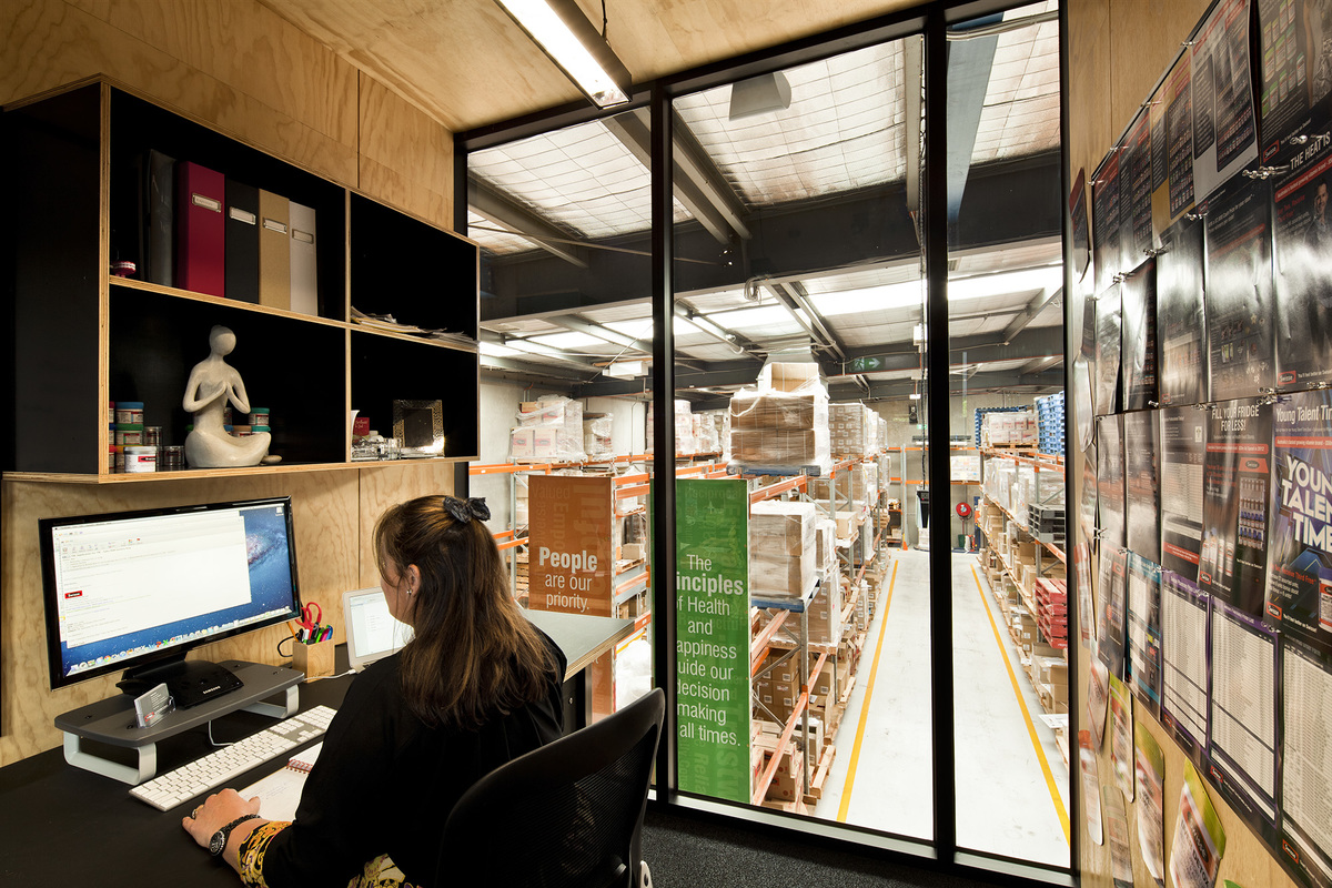 the glazed area separates the office from the warehouse 