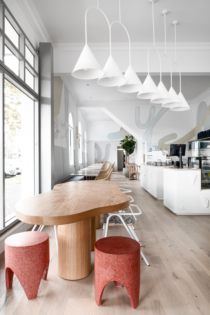 Wooden table in the space with pastel hues