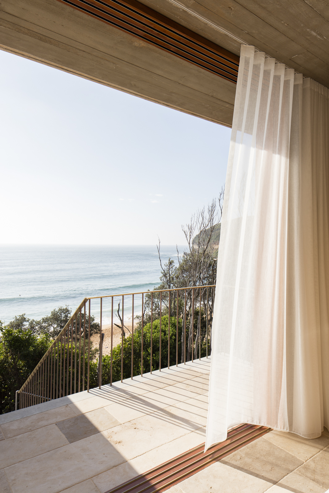 Macmasters Beach House drapes flow in the wind