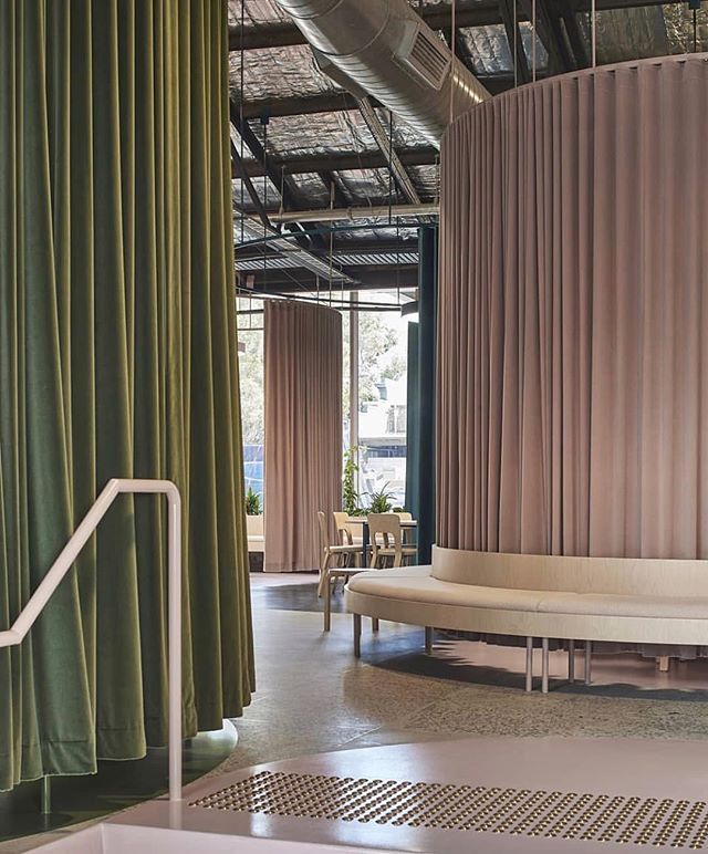 Fluid, curtained spaces define the office