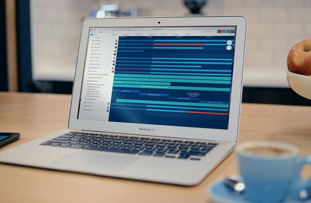 Image of laptop and coffee cup by total synergy