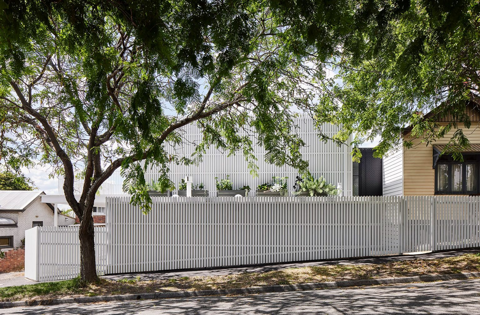 Studio Ilk establishes streetscape connection in Tasmanian family home ...