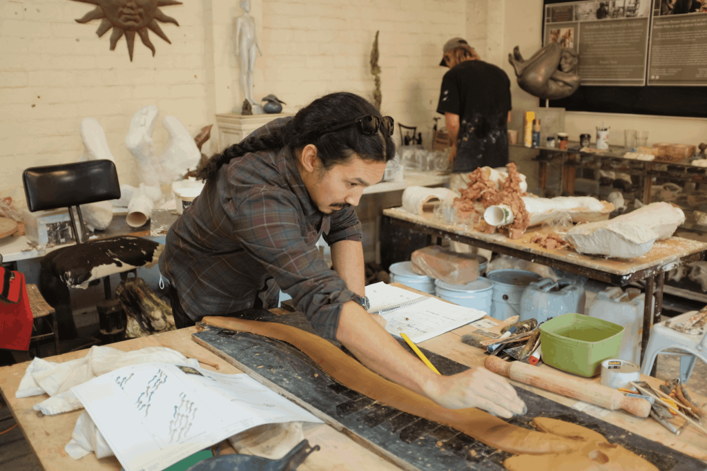 First Nations artist Shay Tobin at work