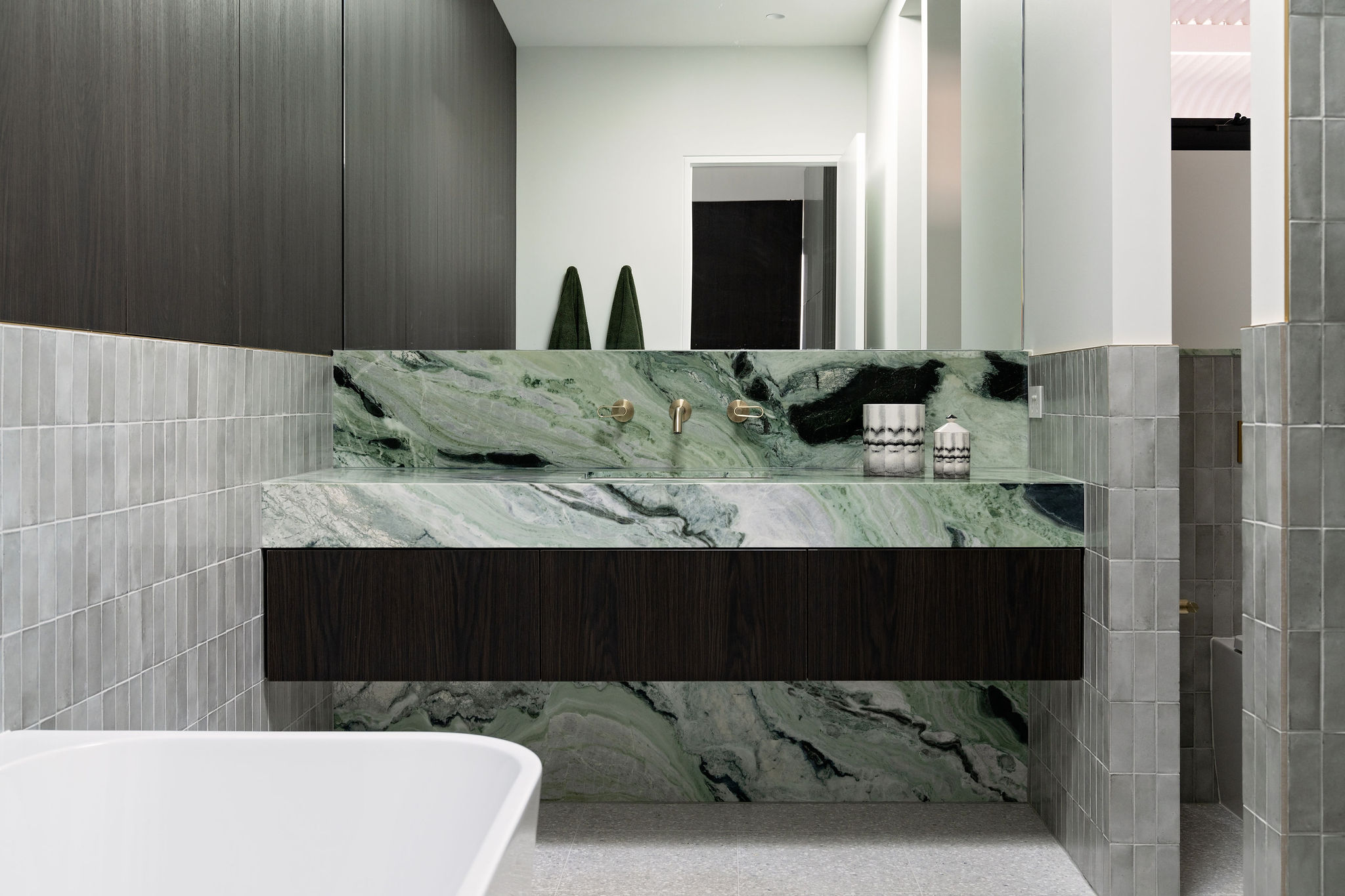 From saunas to the stock market, Adrian Condina believes the bathroom