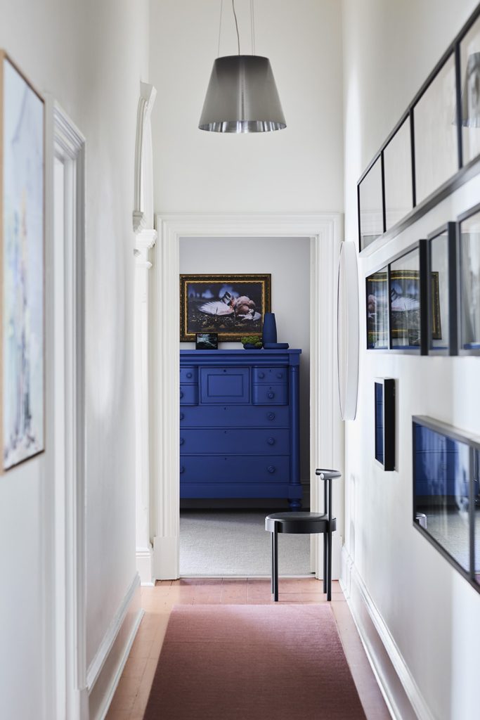 The interior of Queenie blends original historic details, art and pops of rich, vibrant Mediterranean blue. Photography by Sharyn Cairns.